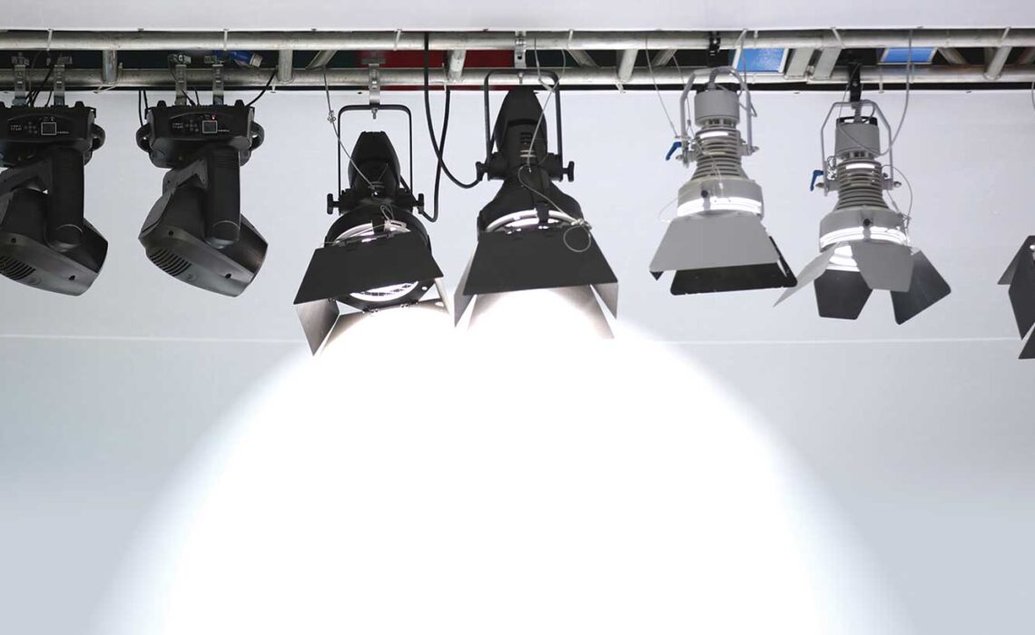 Stage lighting shining a spotlight downward