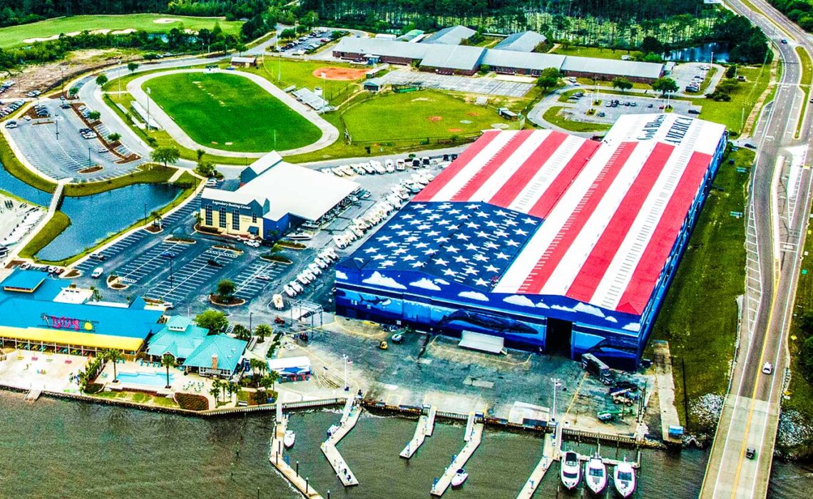 A massive American flag painted on the roof of the boat storage building at Legendary Marine in Destin, Florida