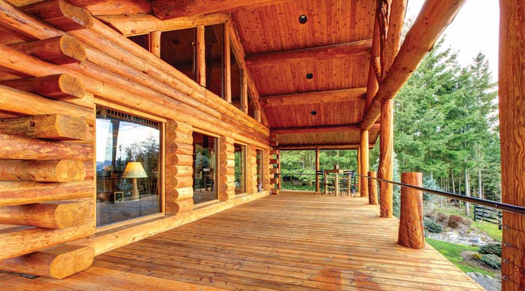 restained log home exterior