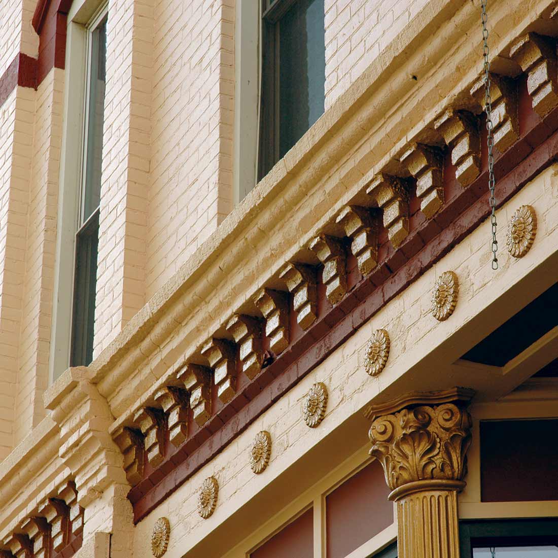 Painted exterior masonry details on the 1881 Frederick Rehfuss Building
