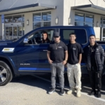 YDM Painting family with their new RAM truck